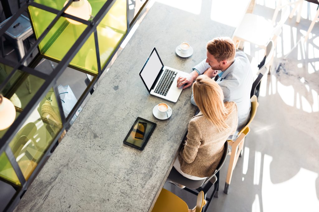 Young businesswoman and man having a conversation